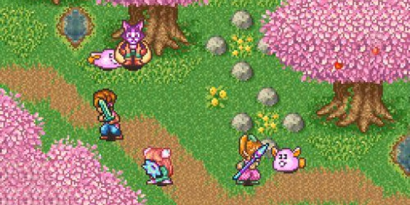 Capture d'écran de Secret of Mana de 1993 où l'on voit le même paysage animé avec des arbres en fleurs, des personnages en action, et des créatures mignonnes dans un monde coloré, mais pixélisé.